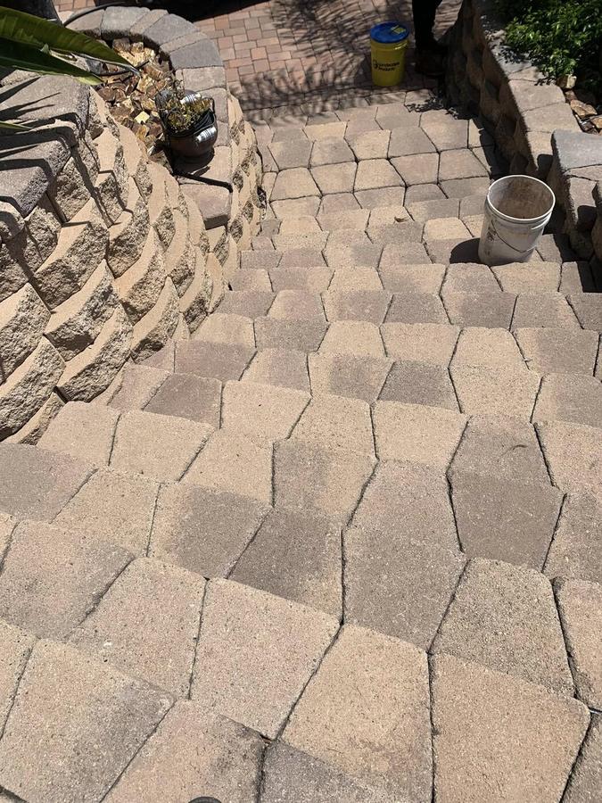 Hexagonal paver steps built into a hillside